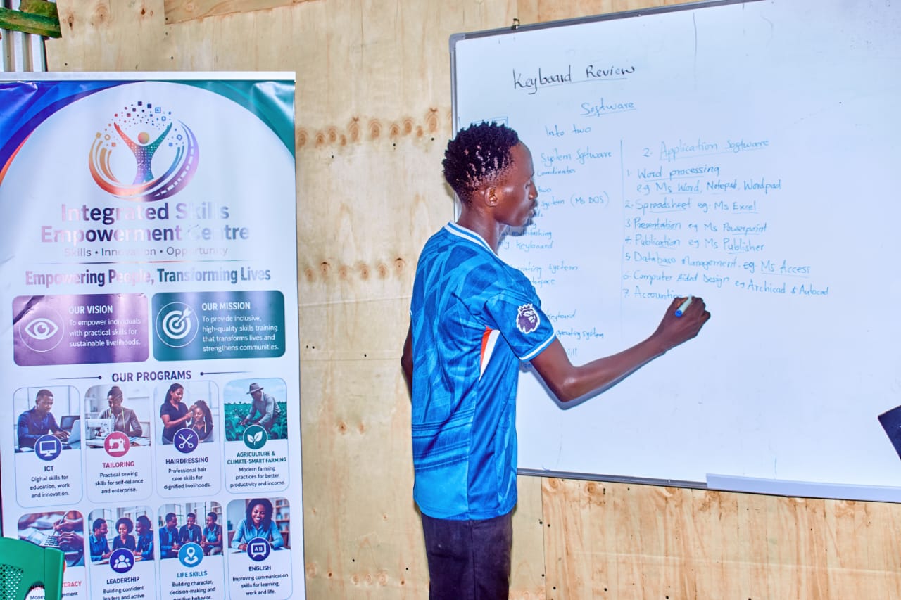 ISEC trainer leading a computer session at the whiteboard